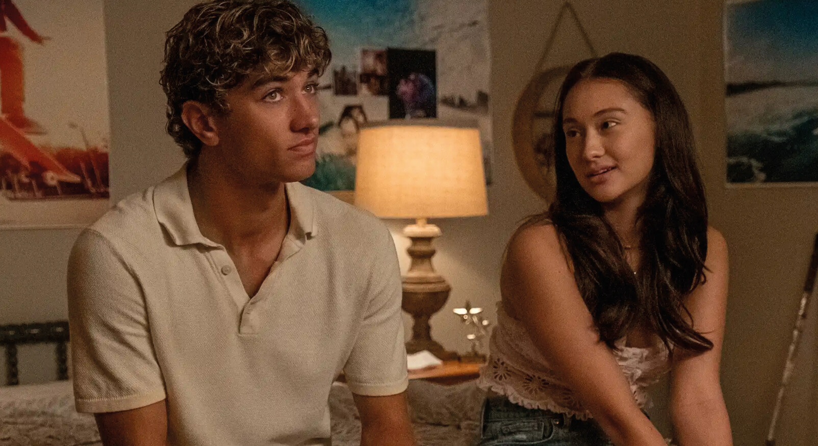 man and woman young in bedroom looking at each other seriously relationship falling apart