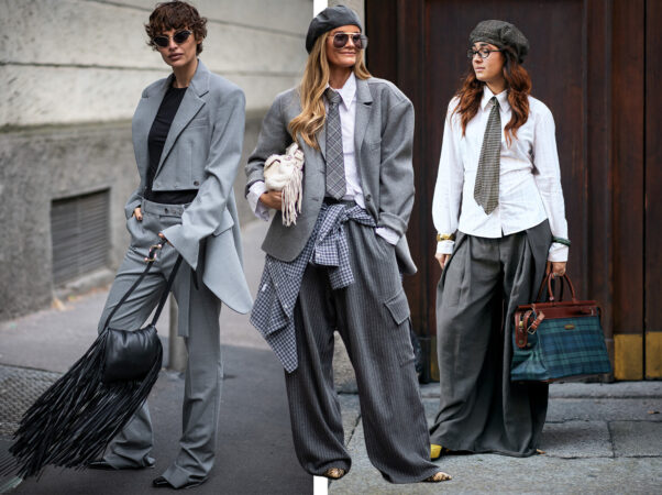  Een collage van drie vrouwen in grijze pakken en overhemden met stropdassen. Links draagt een vrouw een oversized grijs colbert en een grijze pantalon met zwarte accessoires. In het midden draagt een vrouw een grijze blazer over een wit overhemd met stropdas, een geruite blouse om haar middel geknoopt en een grijze pantalon. Rechts draagt een vrouw een wit overhemd met een stropdas, een oversized grijze pantalon en een geruite wollen baret.