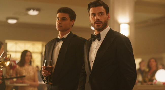 The lead actors of the series Heated Rivalry, Ilya Rozanov and Shane Hollander, in dinner jacket during a formal moment.