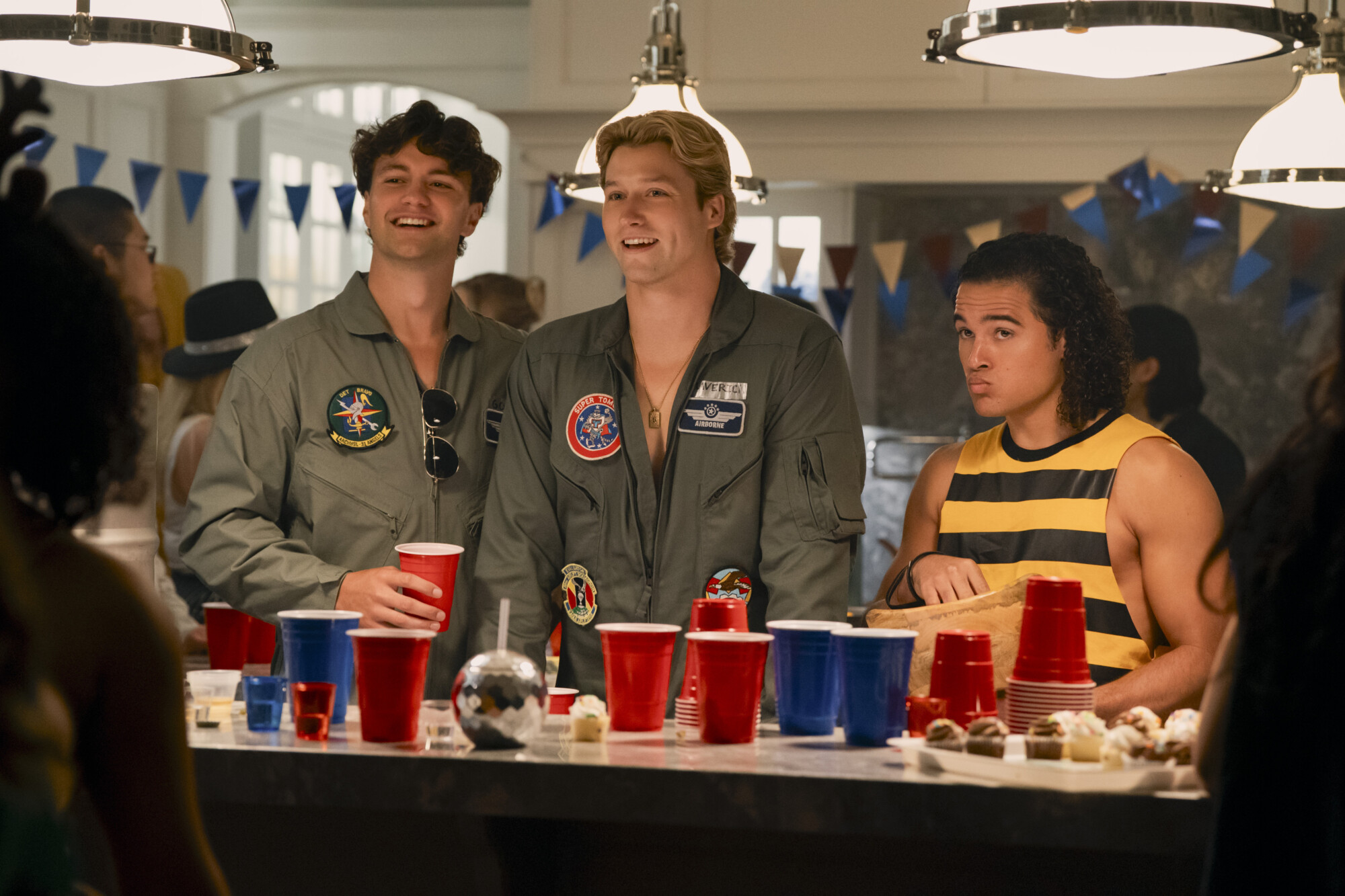 Atmospheric image from Off Campus: the main characters in a campus scene