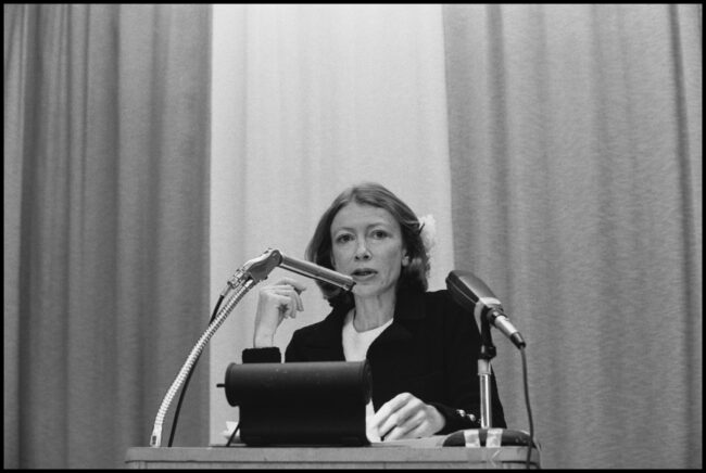 American author Joan Didion speaks at an unspecified event at the College of Marin, Kentfield, California, February 1977. (