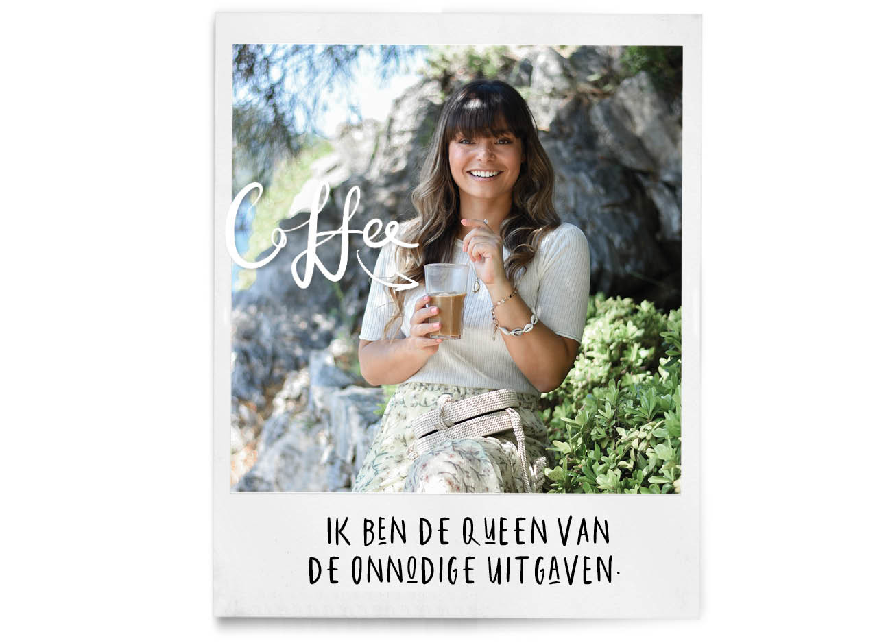 kiki laughing in Turkey with a cup of coffee in her hands